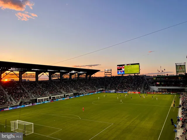 a view of a building with a street