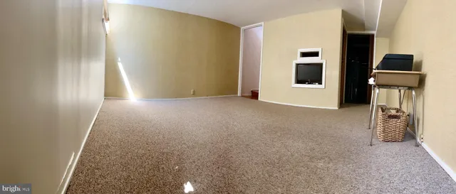 a view of a hallway with closet