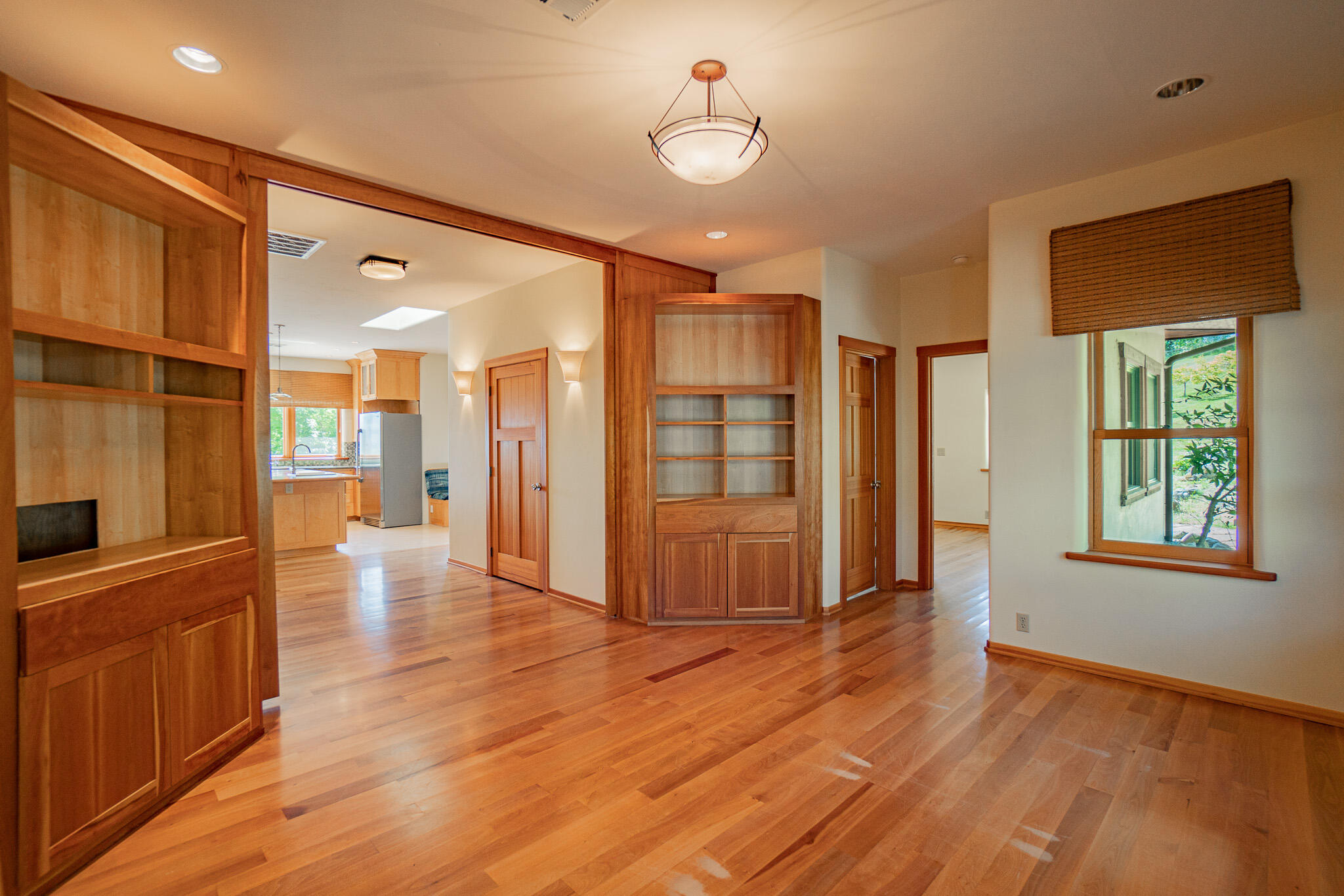 1785 Zemke Road Talent, OR 97540 - Photo 17 of 61 a view of an empty room with wooden floor and a window