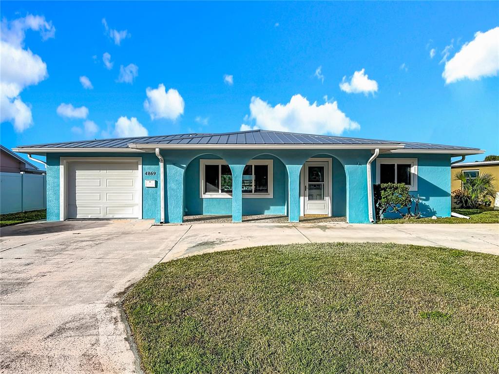 4869 Shell Stream Boulevard New Port Richey, FL 34652 - Photo 1 of 46 a view of an house with backyard space and balcony