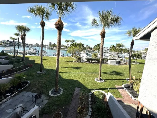 a view balcony with a table and chairs