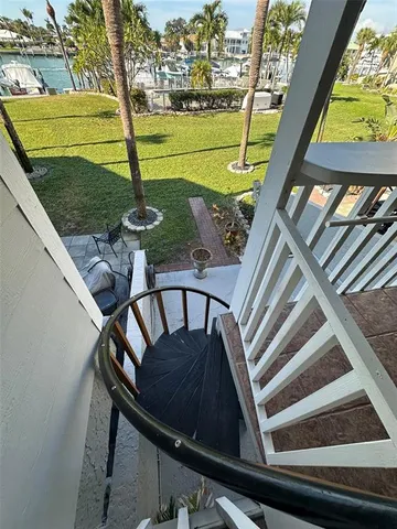 a view of swimming pool with furniture