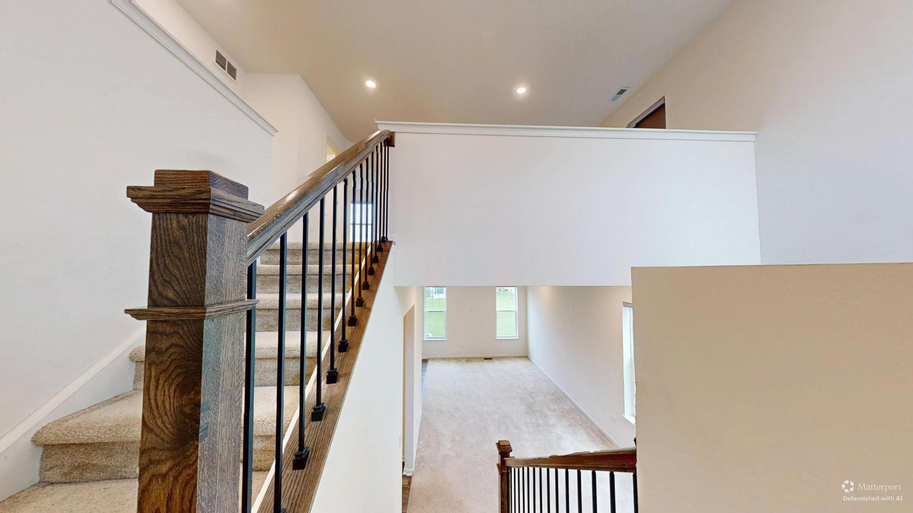 1832 East 110th Lane Crown Point, IN 46307 - Photo 15 of 20 a view of a hallway with wooden floor and entryway