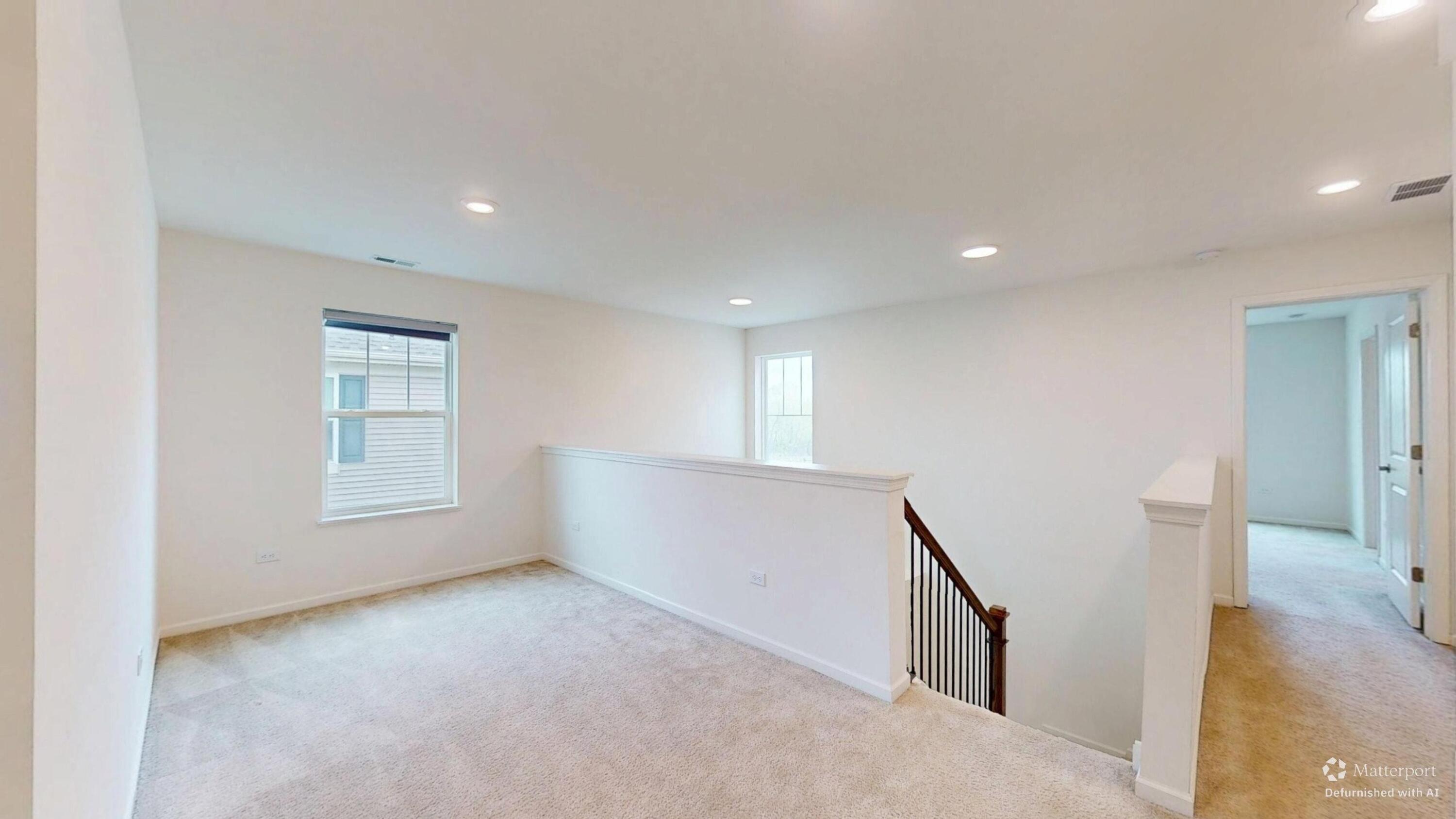1832 East 110th Lane Crown Point, IN 46307 - Photo 16 of 20 a view of room with window and stairs
