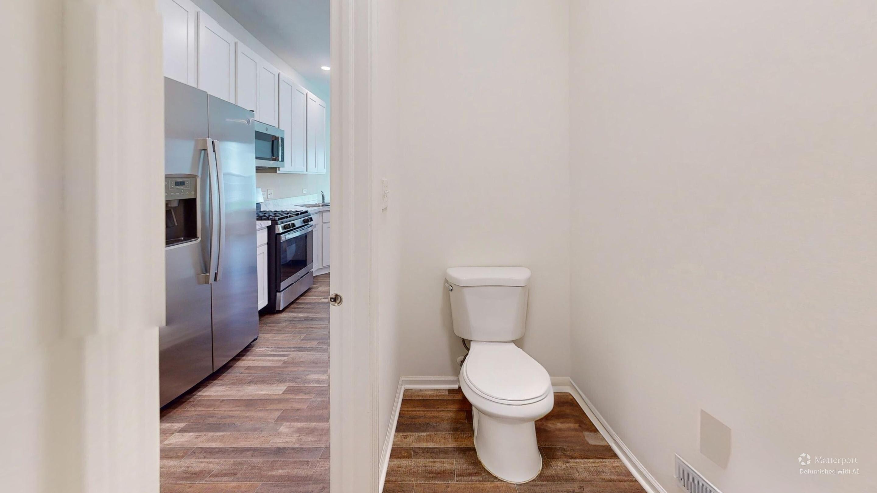 1832 East 110th Lane Crown Point, IN 46307 - Photo 19 of 20 a bathroom with a toilet and a sink