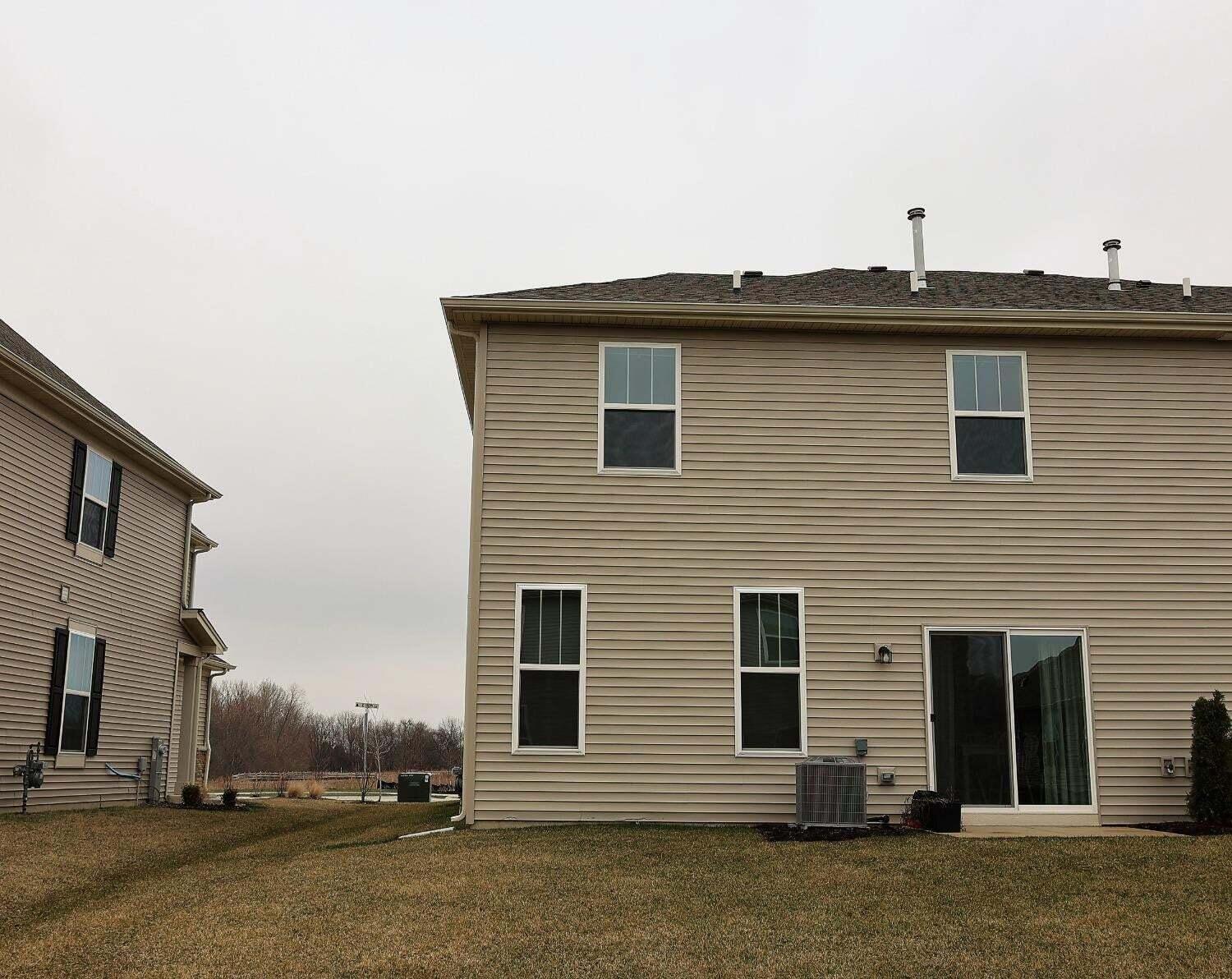 1832 East 110th Lane Crown Point, IN 46307 - Photo 2 of 20 a view of a house with a yard