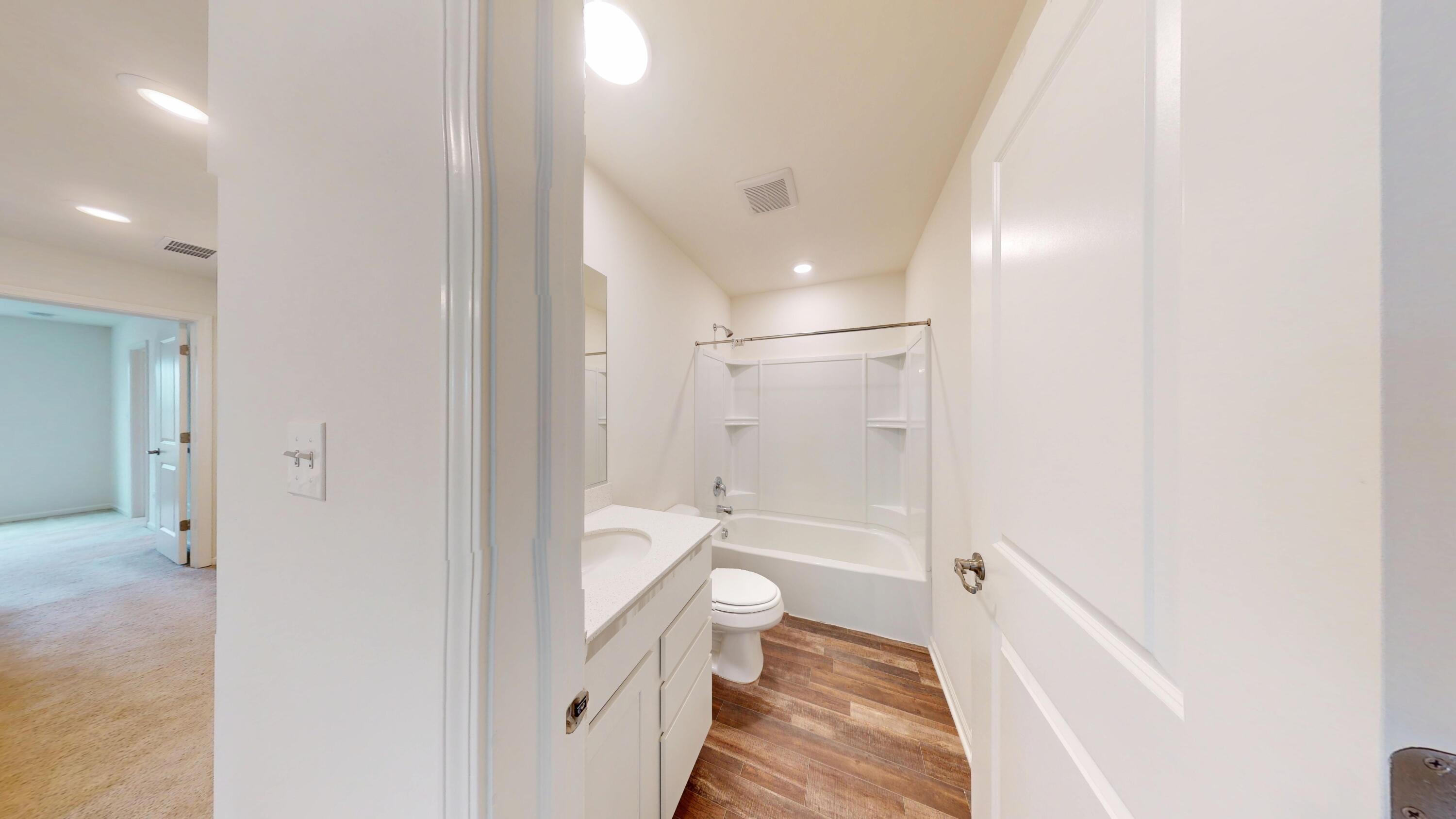 1832 East 110th Lane Crown Point, IN 46307 - Photo 7 of 20 a bathroom with a sink and toilet