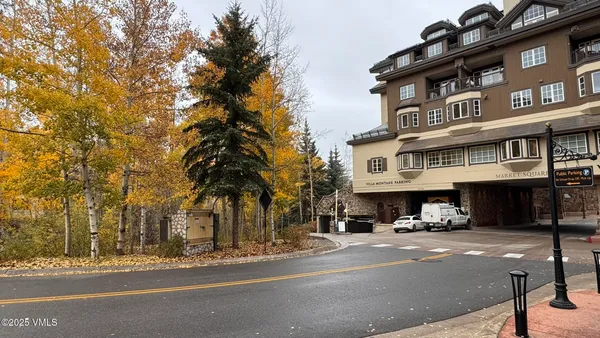 a view of a street with houses