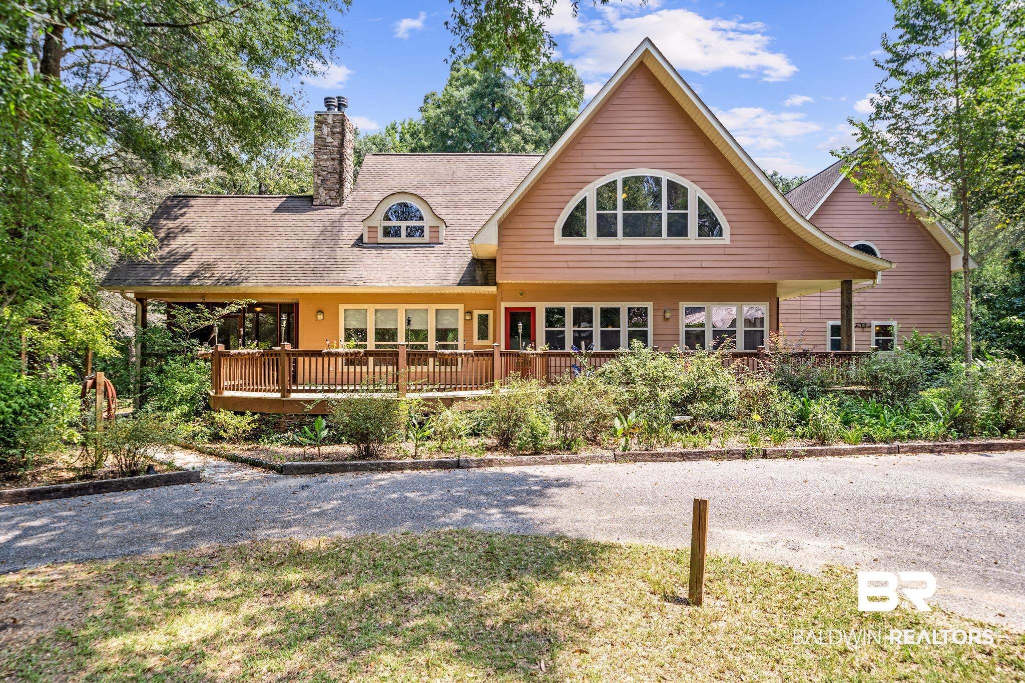 8321 Dixon Road Bay Minette, AL 36507 - Photo 6 of 79 View of front of house featuring a wooden deck