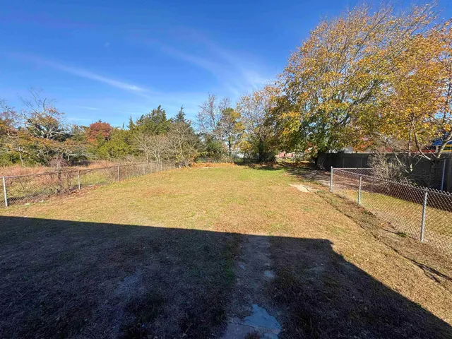 a view of an outdoor space and a yard