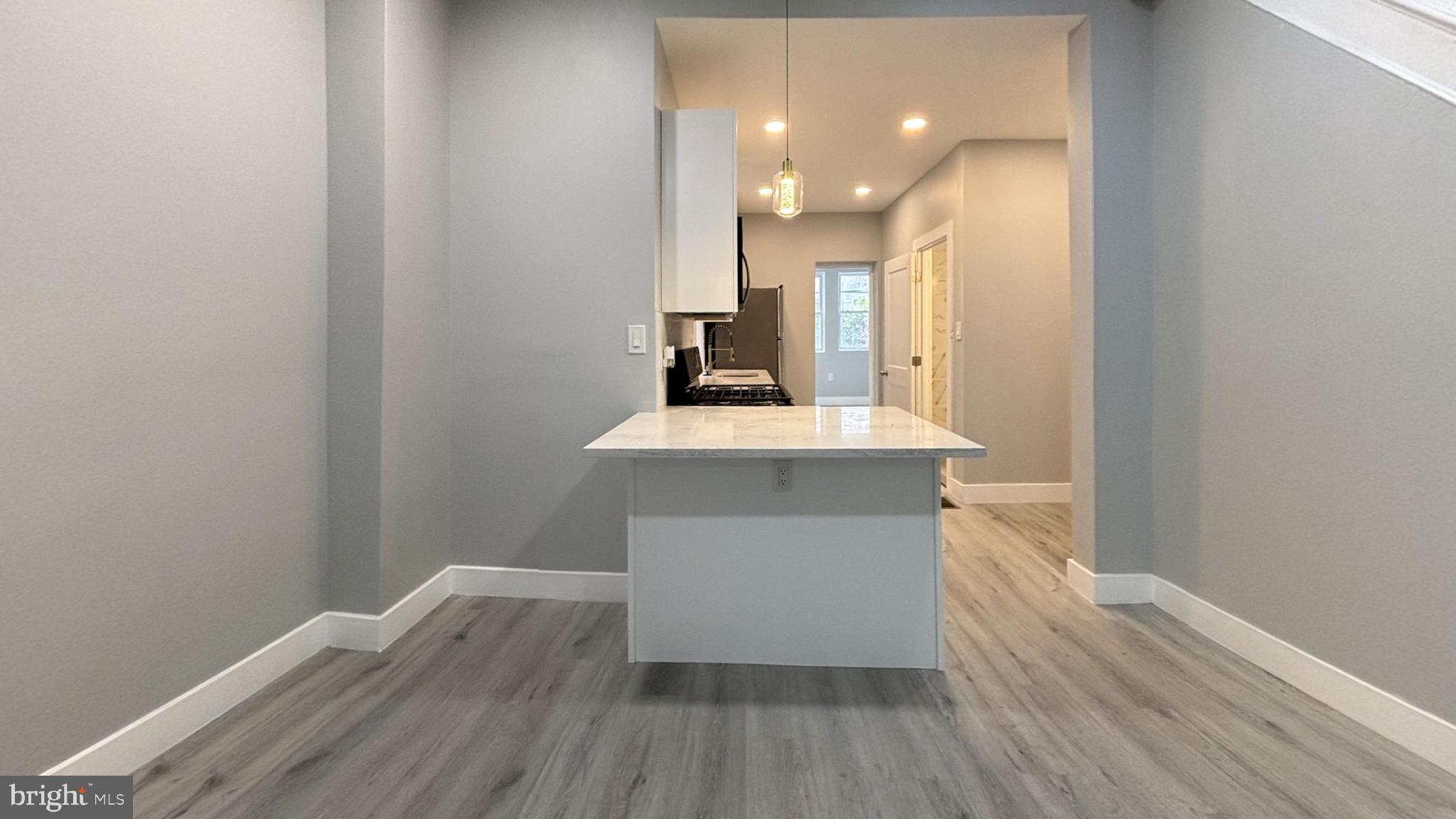 1329 South 29th Street Philadelphia, PA 19146 - Photo 1 of 4 a view of kitchen with wooden floor