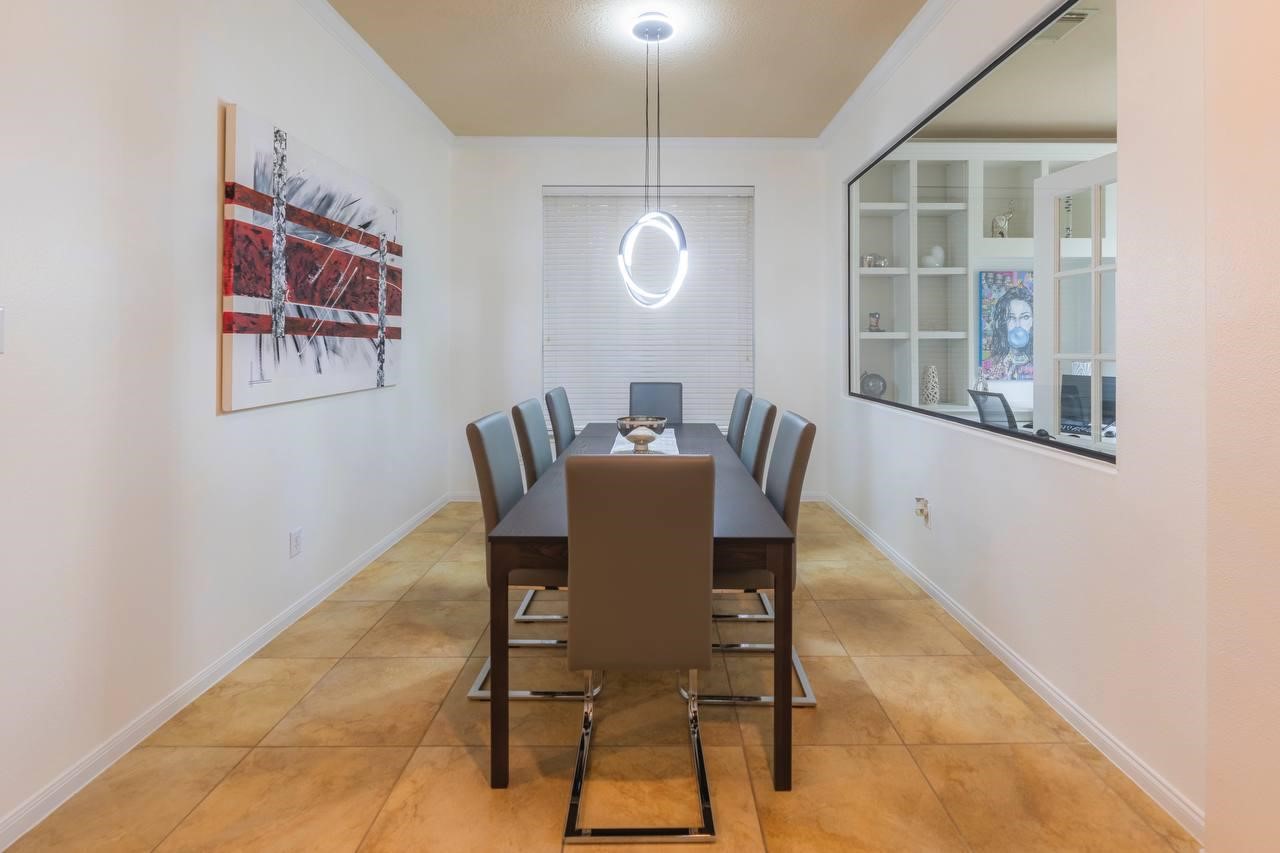 6 Avenswood Place Spring, TX 77382 - Photo 3 of 22 a view of a dining room with furniture