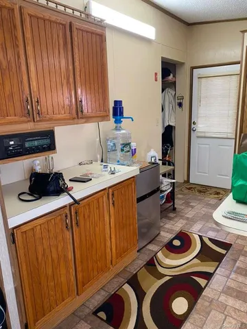 a room with furniture and a wooden floor