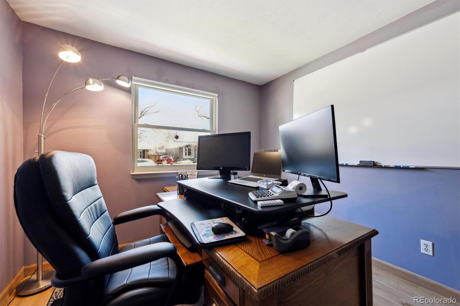 8403 Chase Drive Arvada, CO 80003 - Photo 19 of 39 a view of a workspace with furniture