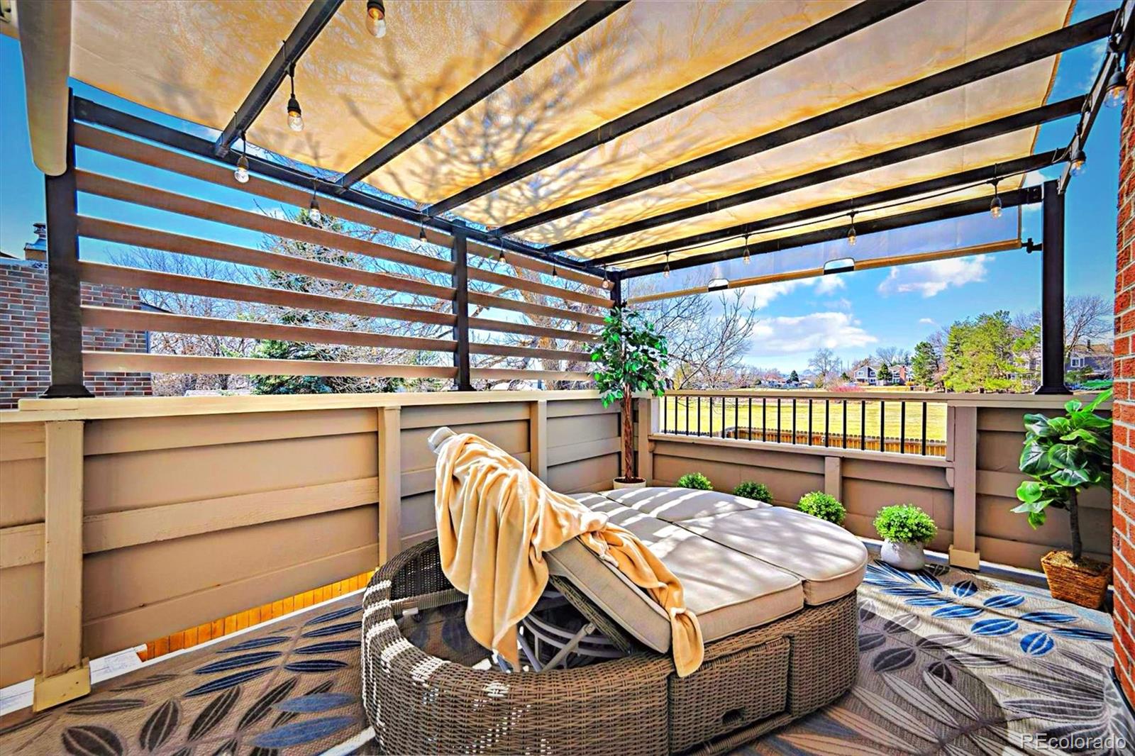 8403 Chase Drive Arvada, CO 80003 - Photo 23 of 39 a view of a two chairs in the deck