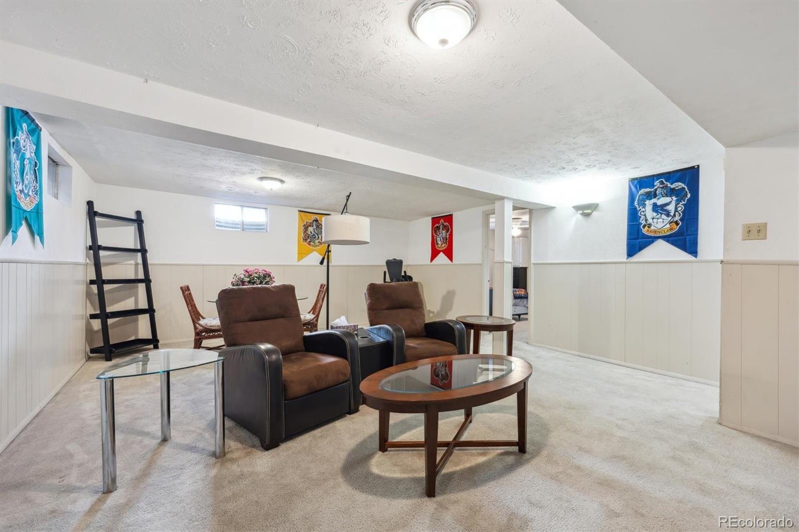 8403 Chase Drive Arvada, CO 80003 - Photo 30 of 39 a living room with furniture