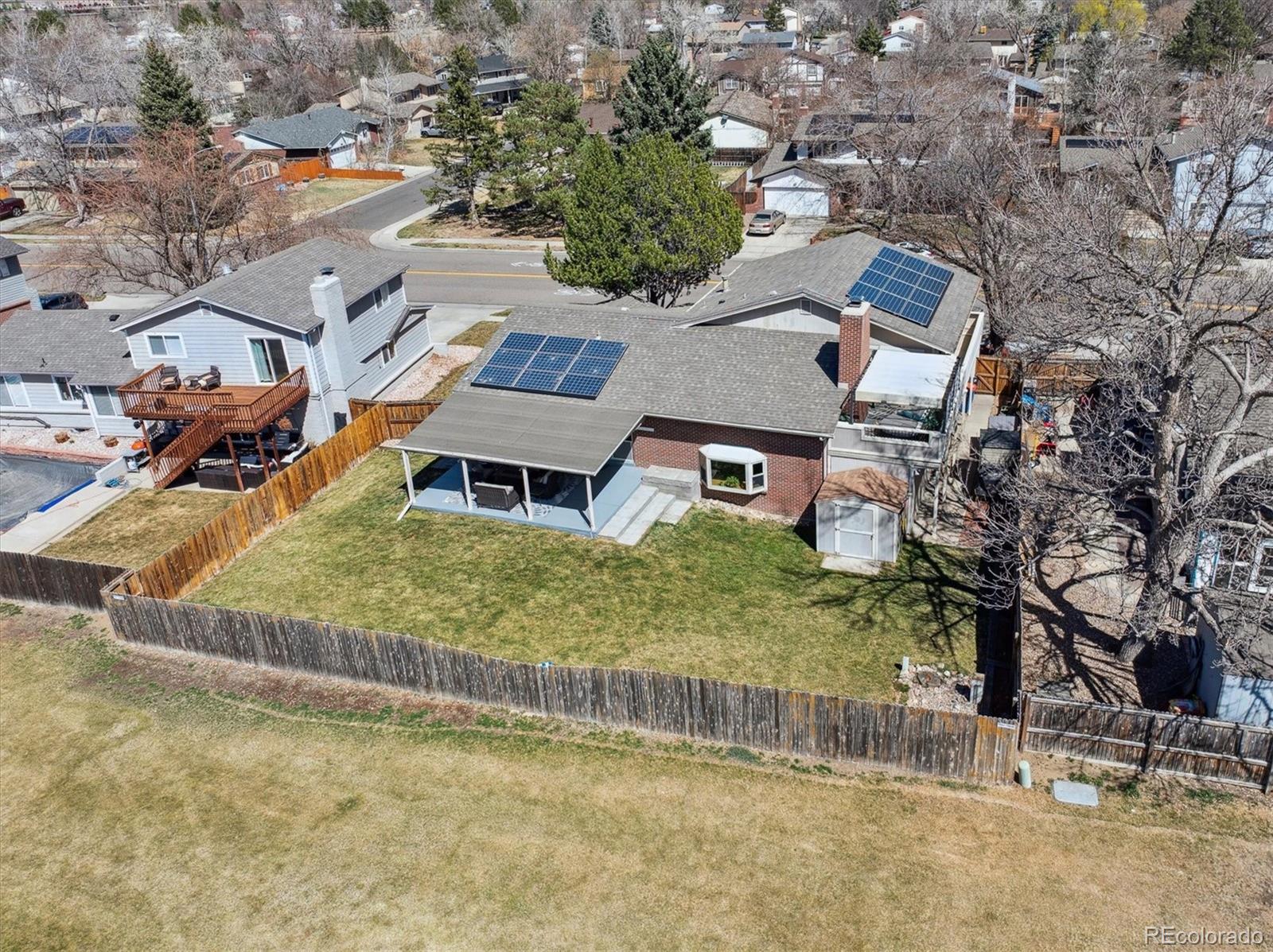 8403 Chase Drive Arvada, CO 80003 - Photo 35 of 39 an aerial view of residential houses with yard