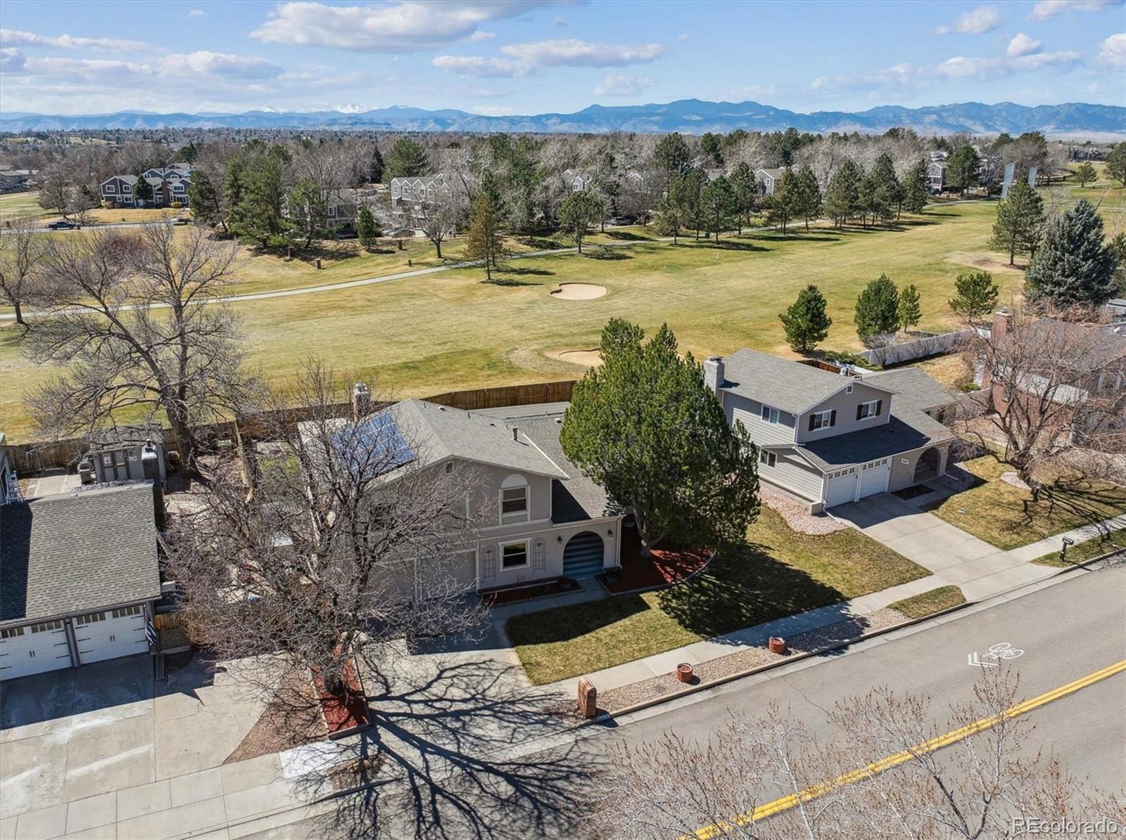 8403 Chase Drive Arvada, CO 80003 - Photo 36 of 39 a view of a lake with couches and city view