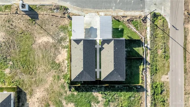 a view of swimming pool with a yard