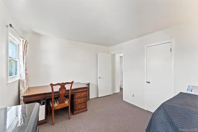 a view of a livingroom with furniture
