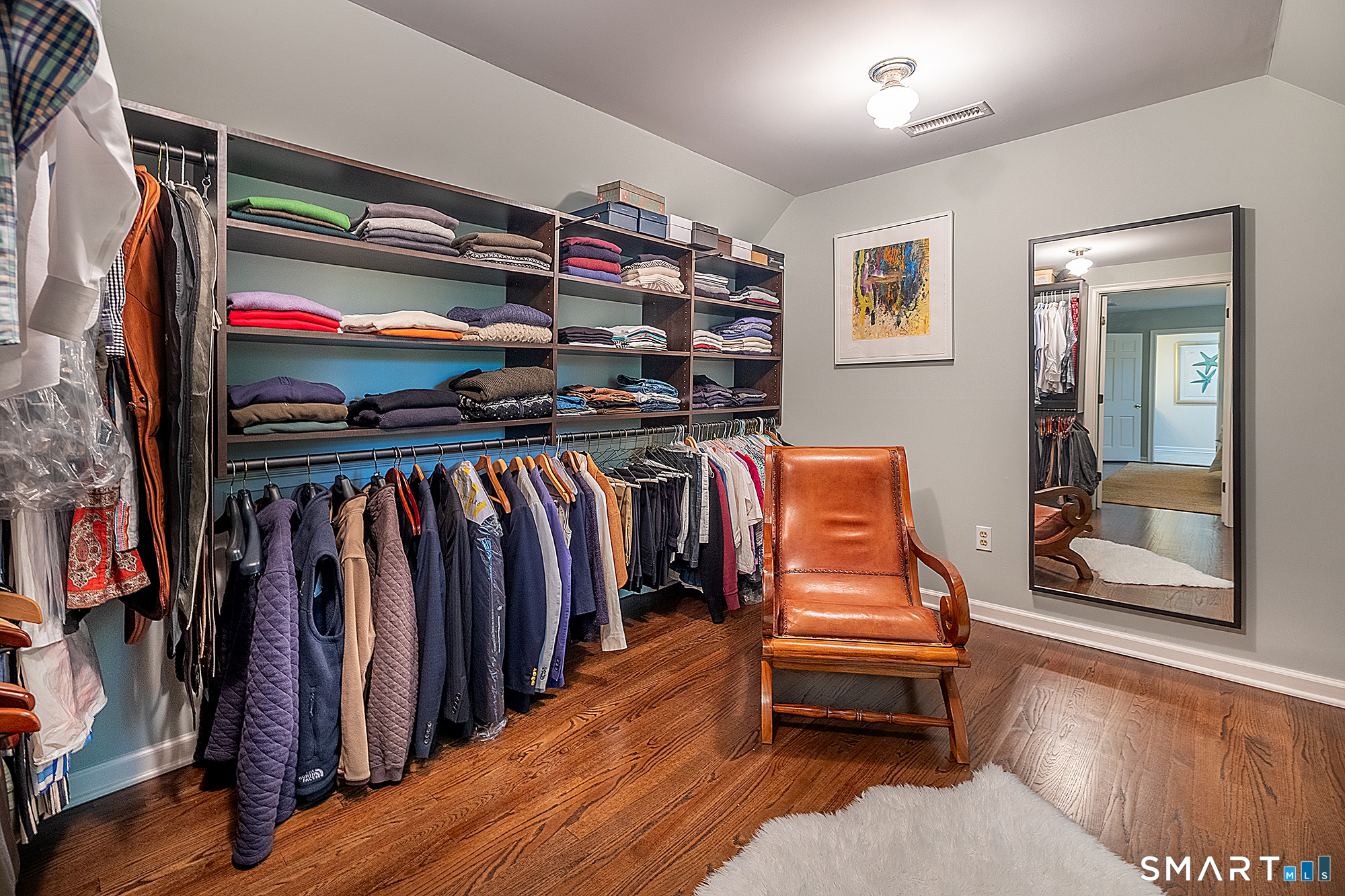 33 Hunter Lane Ridgefield, CT 06877 - Photo 25 of 39 a walk in closet with clothes and shoes