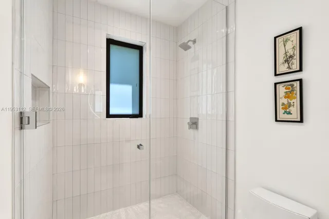 a living room with fireplace furniture and a flat screen tv