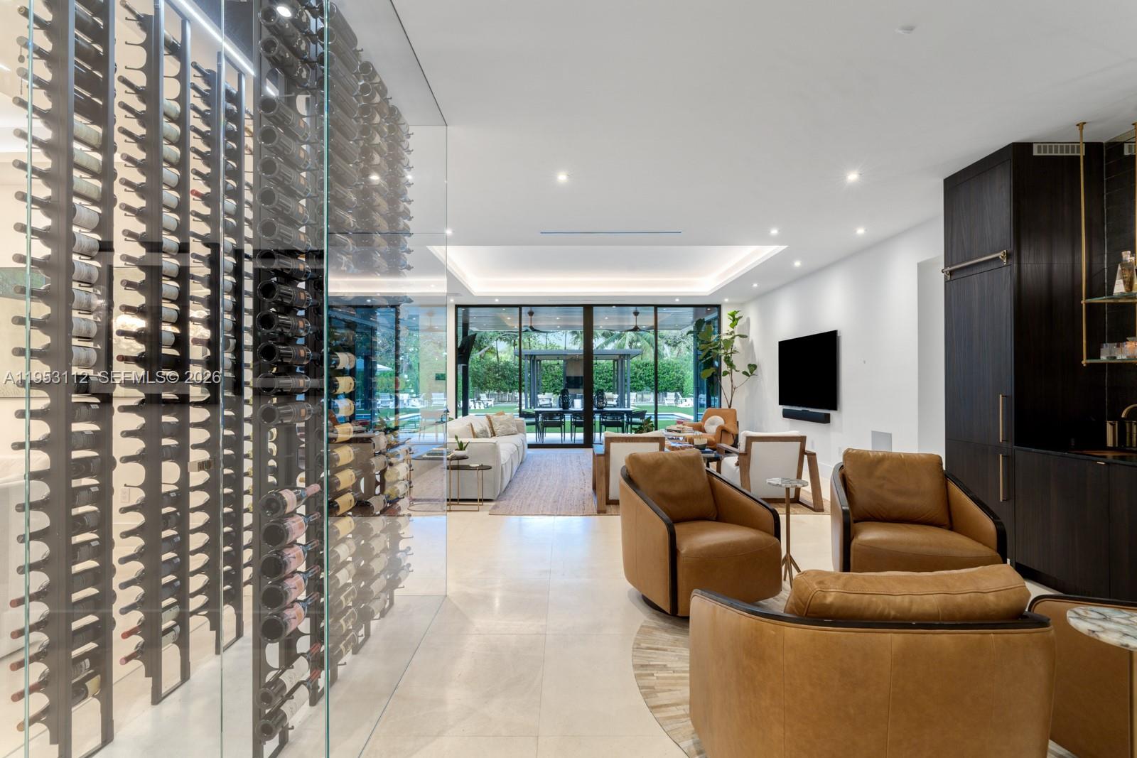 6031 Southwest 88th Street Miami, FL 33156 - Photo 15 of 81 a living room with fireplace furniture and a flat screen tv