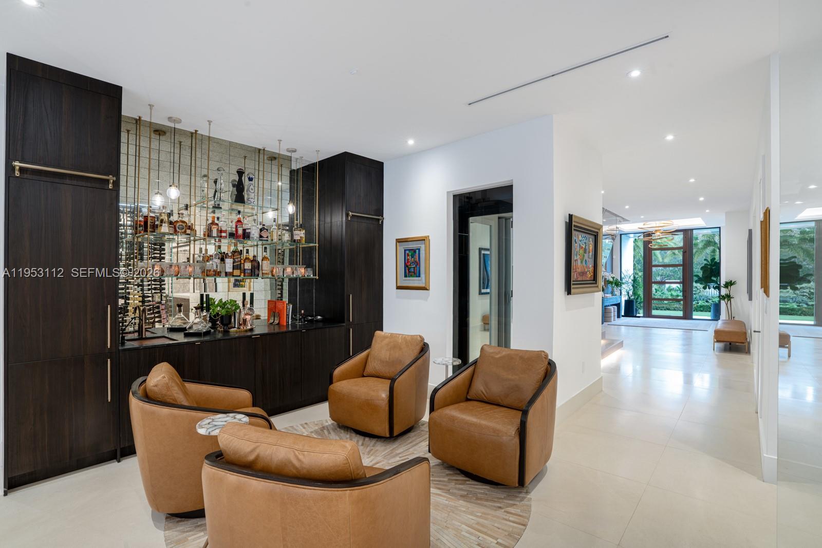 6031 Southwest 88th Street Miami, FL 33156 - Photo 17 of 81 a living room with furniture and a large window