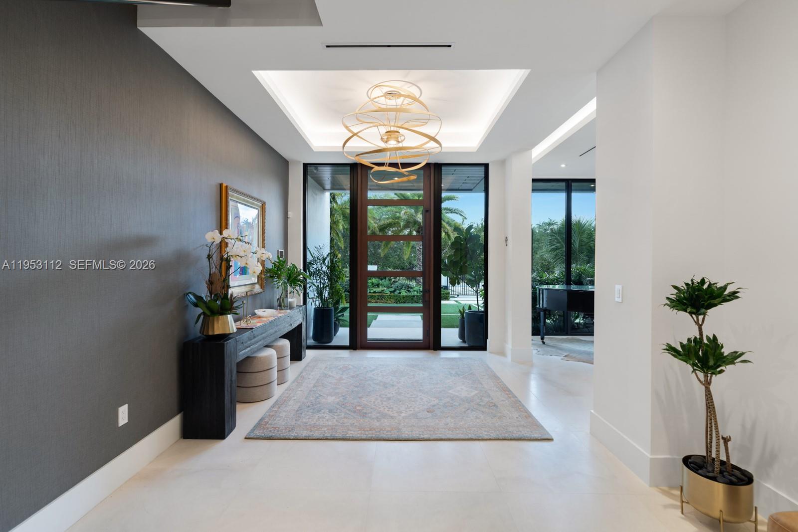 6031 Southwest 88th Street Miami, FL 33156 - Photo 24 of 81 a lobby with furniture and windows