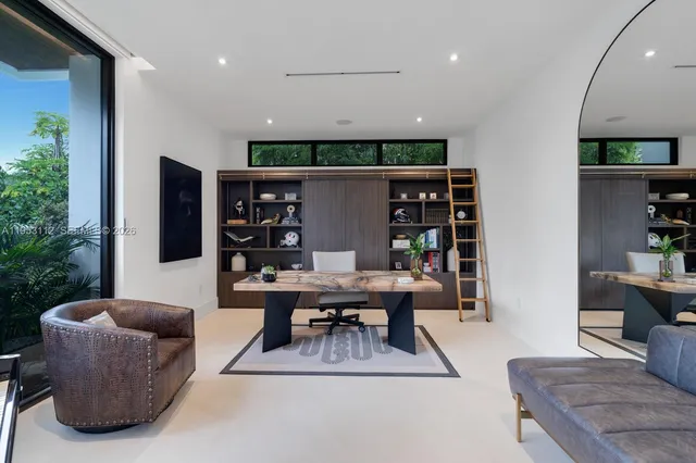 a bathroom with a sink a toilet a glass door shower and mirror