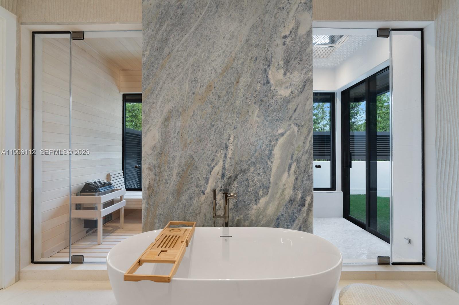 6031 Southwest 88th Street Miami, FL 33156 - Photo 30 of 81 a white bath tub sitting in a bathroom next to a tub