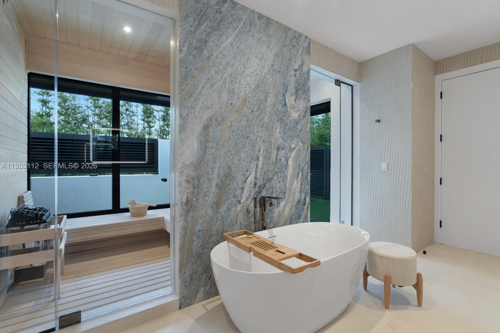 6031 Southwest 88th Street Miami, FL 33156 - Photo 31 of 81 a living room with a couch and a table