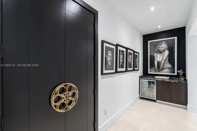 a spacious bedroom with a bed and a potted plant