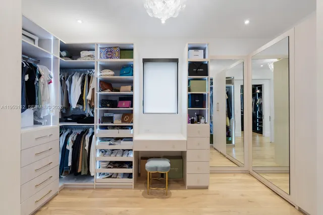 a view of a chair and table in the back yard