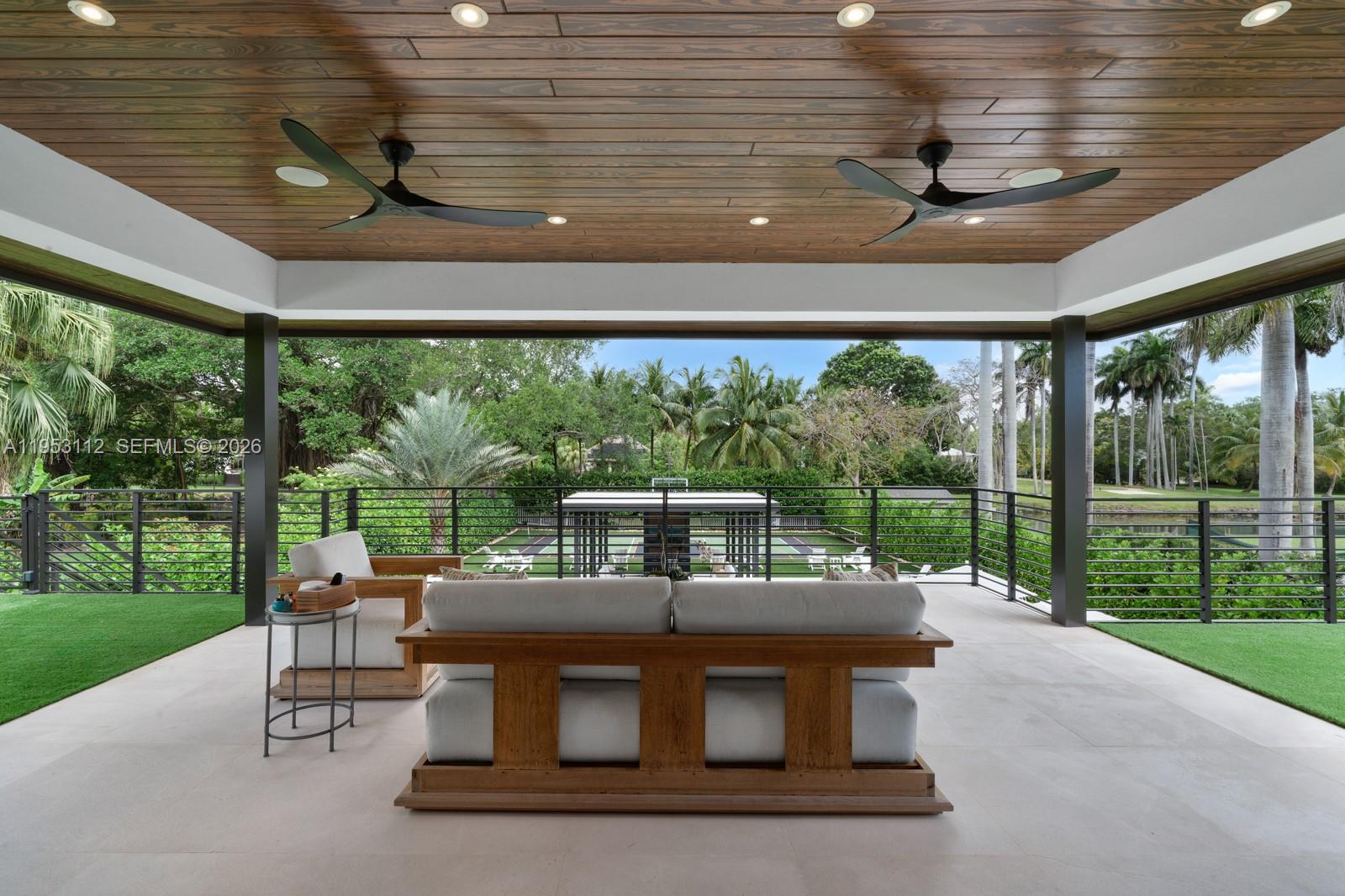 6031 Southwest 88th Street Miami, FL 33156 - Photo 46 of 81 a view of a patio with a yard