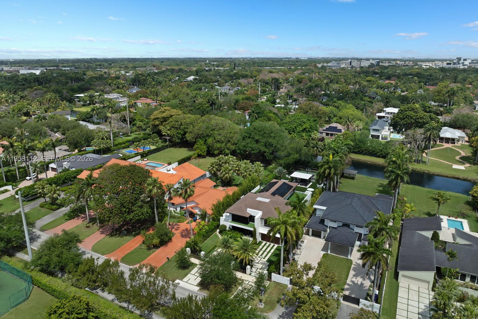 6031 Southwest 88th Street Miami, FL 33156 - Photo 81 of 81 an aerial view of residential houses with outdoor space and river