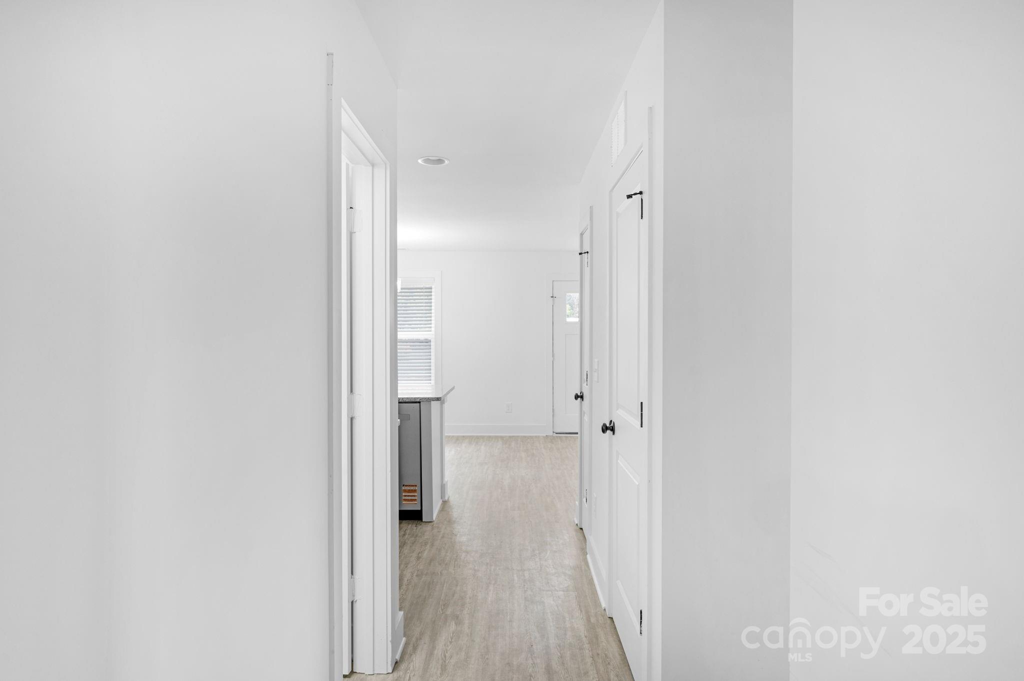 324 Ashford Street Chester, SC 29706 - Photo 12 of 20 a view of a room with wooden floor