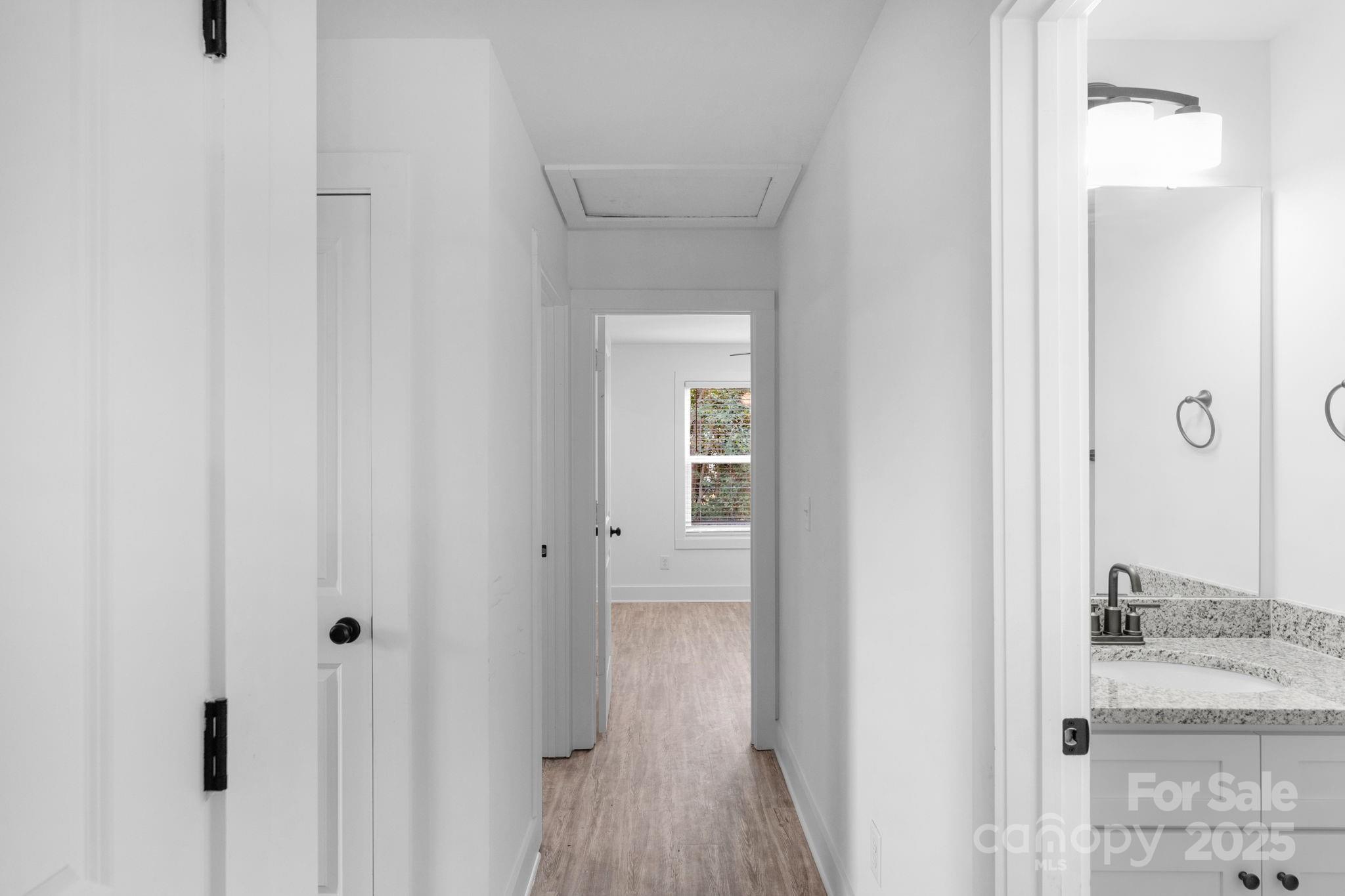 324 Ashford Street Chester, SC 29706 - Photo 10 of 20 a view of a bathroom from a hallway