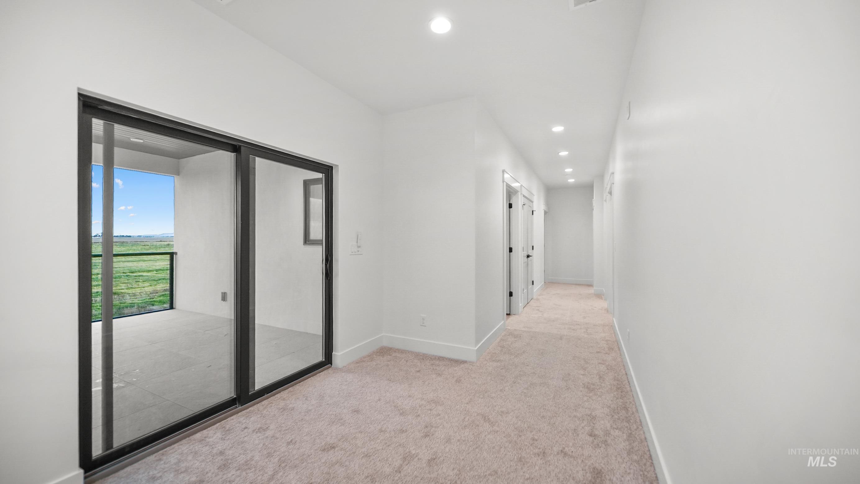 696 Full Moon Way Twin Falls, ID 83301 - Photo 15 of 48 Corridor featuring light carpet and recessed lighting