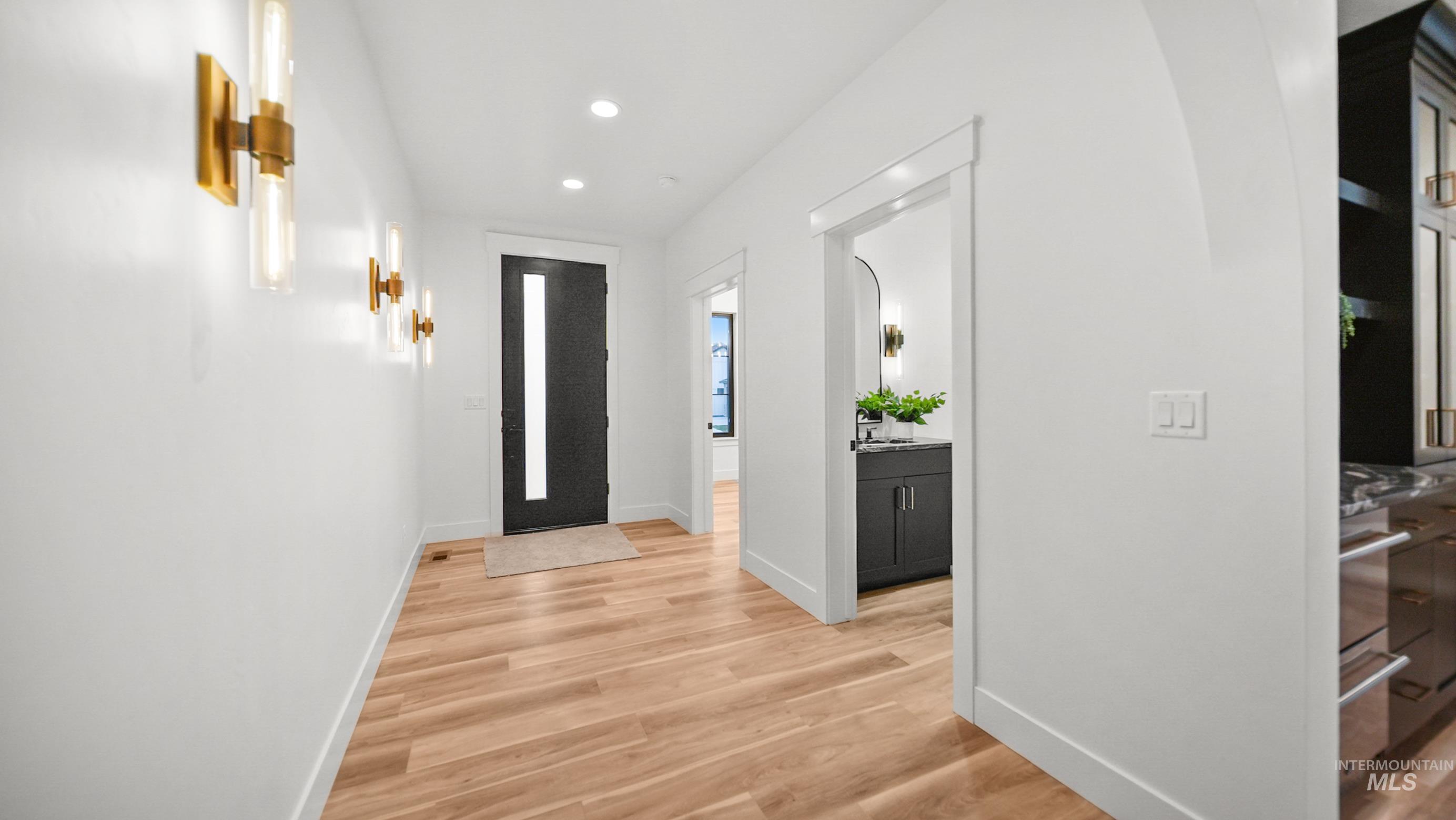 696 Full Moon Way Twin Falls, ID 83301 - Photo 2 of 48 Entryway with light wood-type flooring and recessed lighting