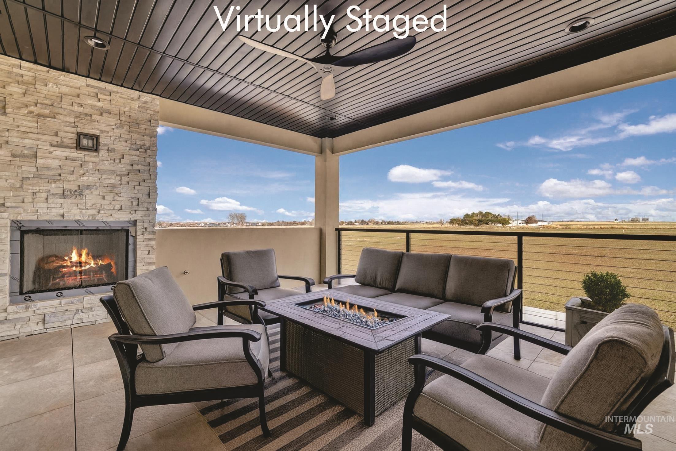 696 Full Moon Way Twin Falls, ID 83301 - Photo 19 of 48 View of patio / terrace with an outdoor living space with a fireplace