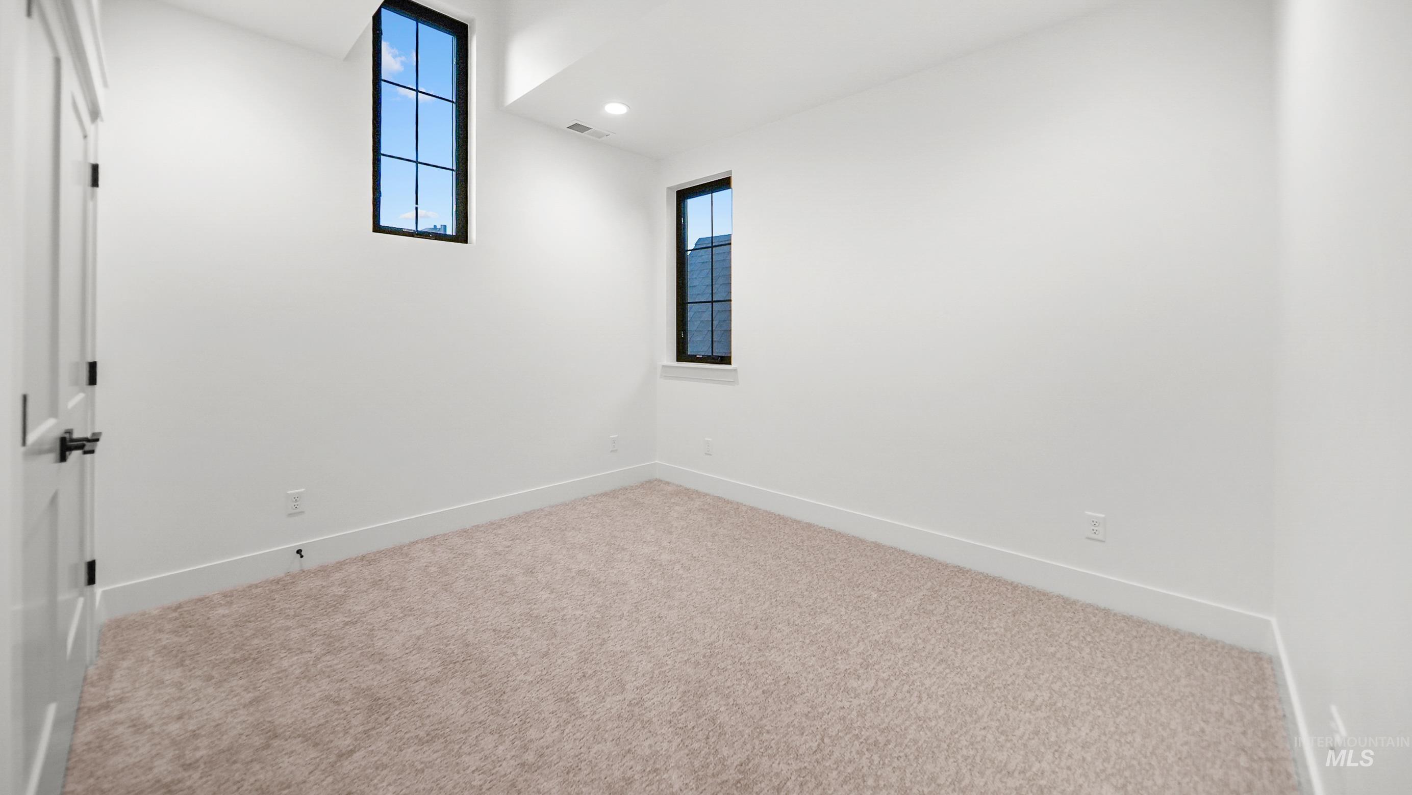 696 Full Moon Way Twin Falls, ID 83301 - Photo 28 of 48 Carpeted spare room with baseboards and recessed lighting