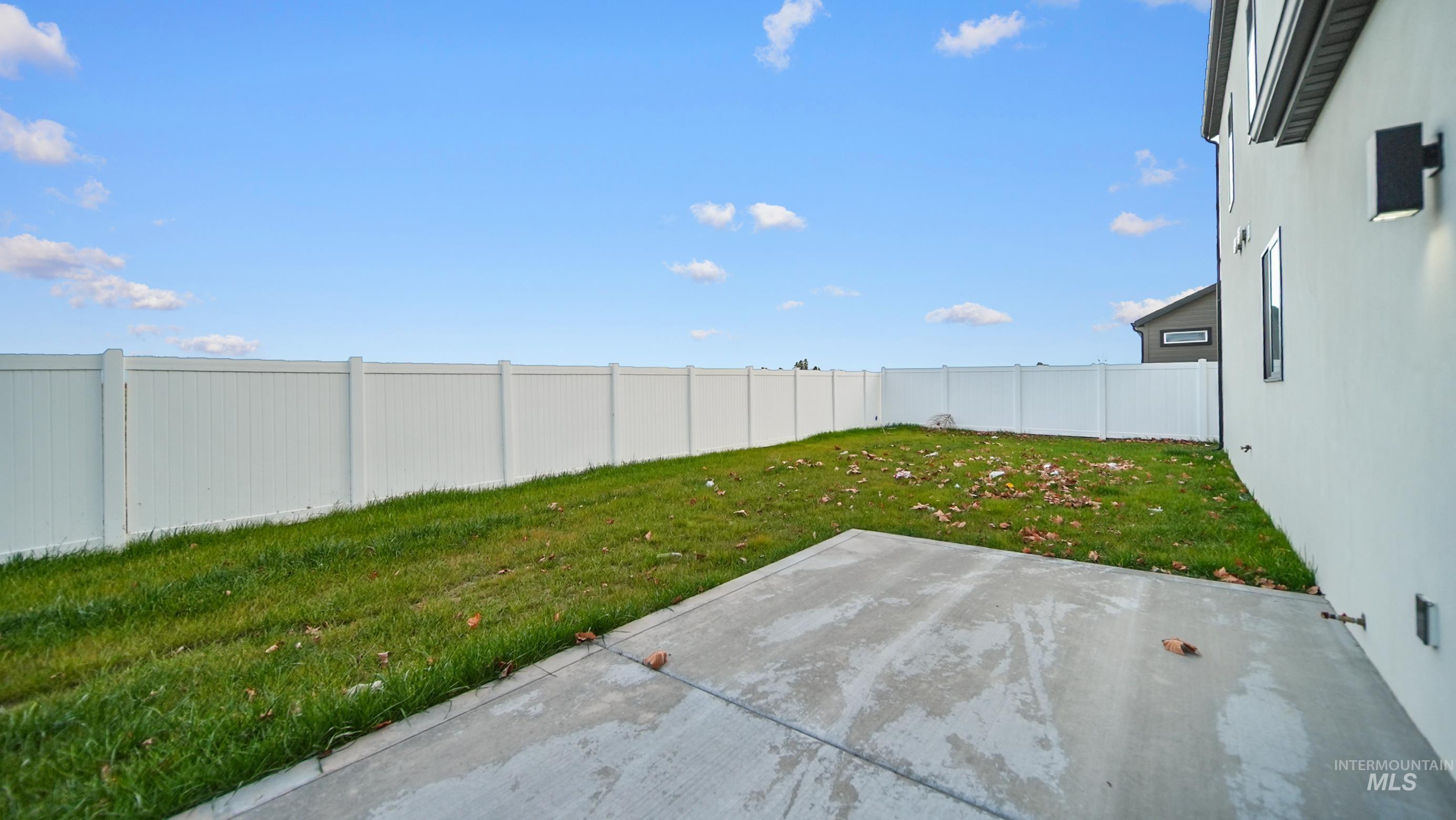 696 Full Moon Way Twin Falls, ID 83301 - Photo 40 of 48 Fenced backyard with a patio area