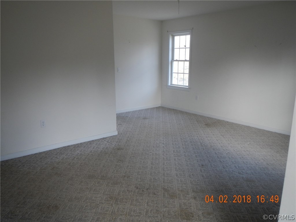 24480 Johnson Road Jetersville, VA 23083 - Photo 13 of 16 an empty room with windows