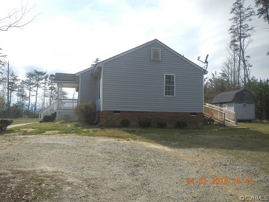 24480 Johnson Road Jetersville, VA 23083 - Photo 2 of 16 a backyard of house with a sink