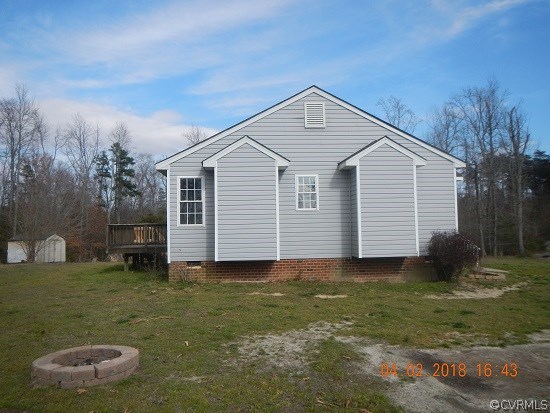 24480 Johnson Road Jetersville, VA 23083 - Photo 4 of 16 a view of a house with a yard