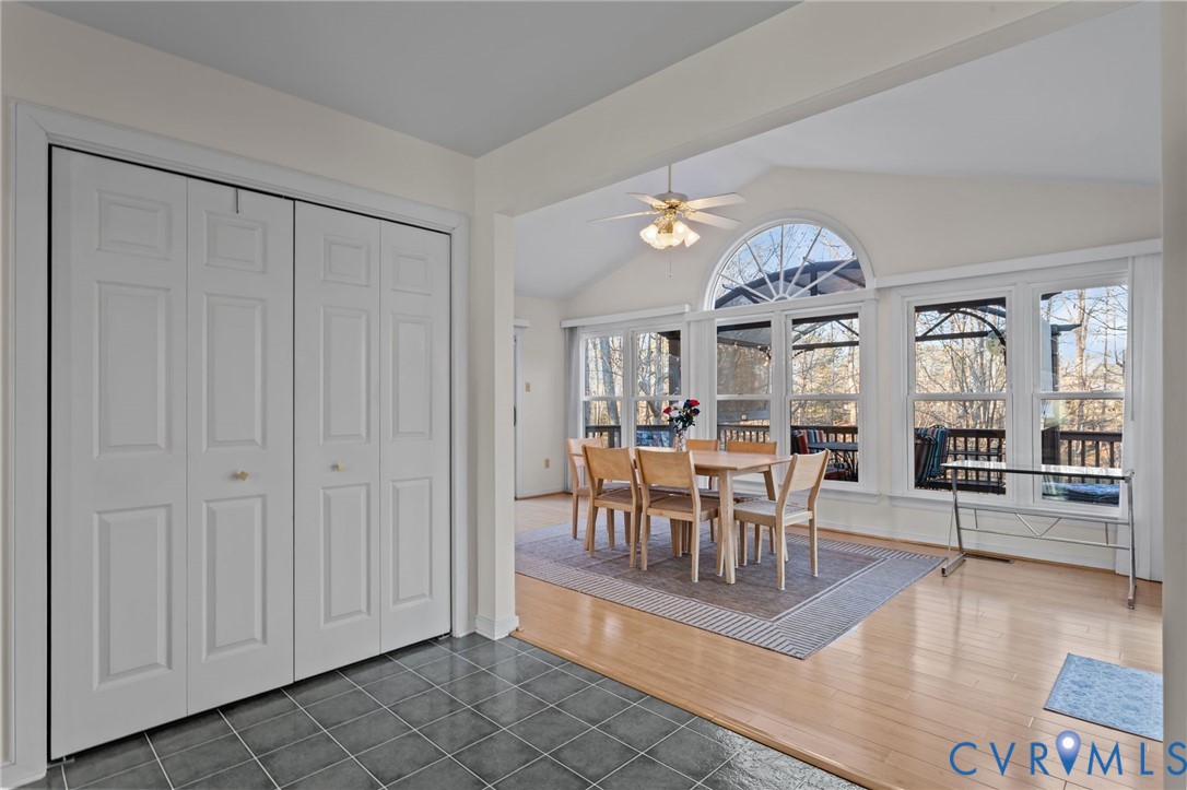 518 Rebel Ridge Road Colonial Heights, VA 23834 - Photo 5 of 44 a view of a dining room and livingroom with furniture wooden floor and a rug