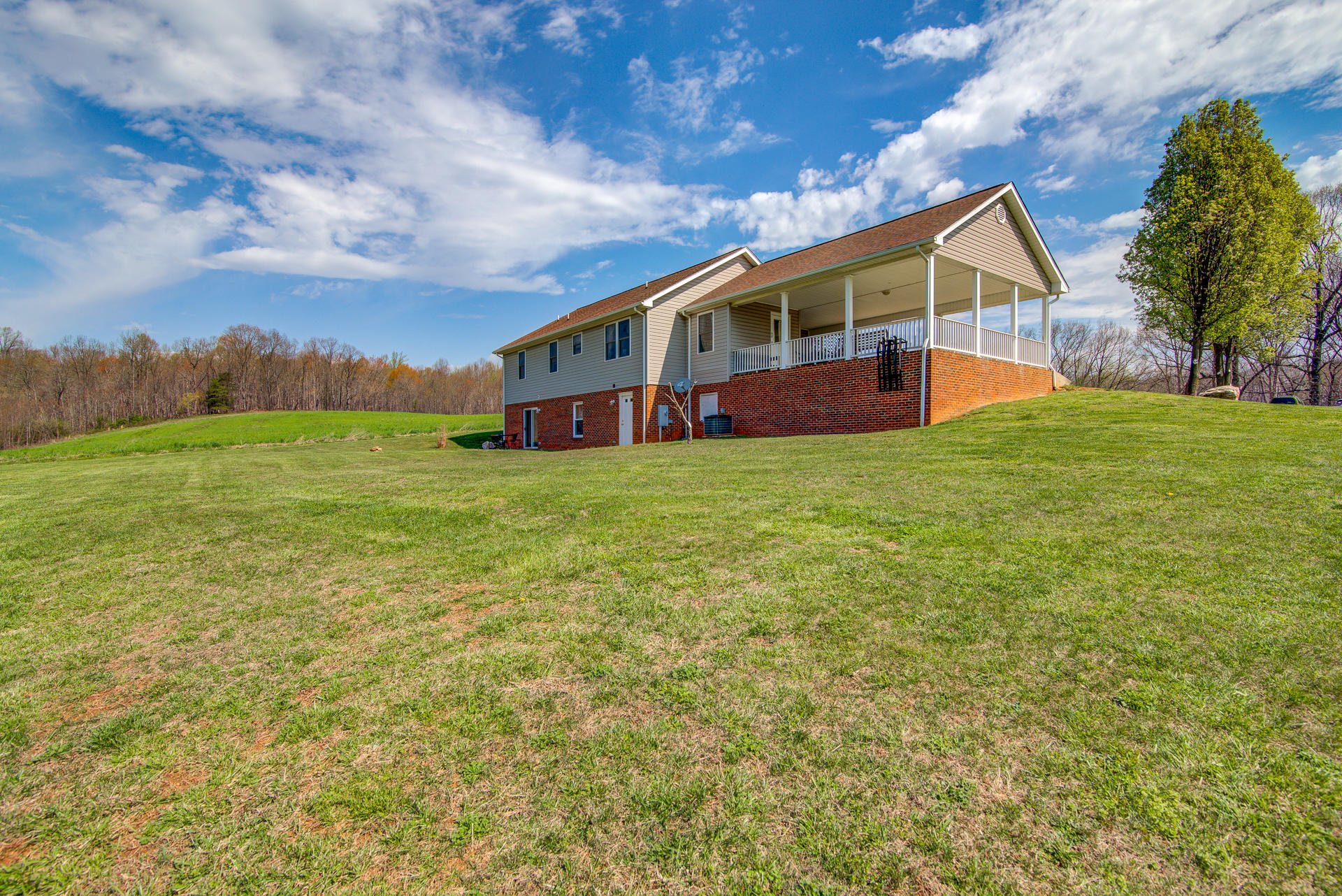 3007 Sandy Level Road Goodview, VA 24095 - Photo 17 of 51 a view of a house with a yard
