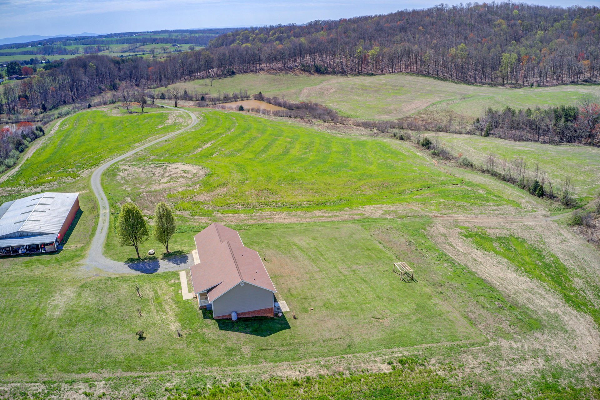 3007 Sandy Level Road Goodview, VA 24095 - Photo 21 of 51 an aerial view of a golf course with a big yard