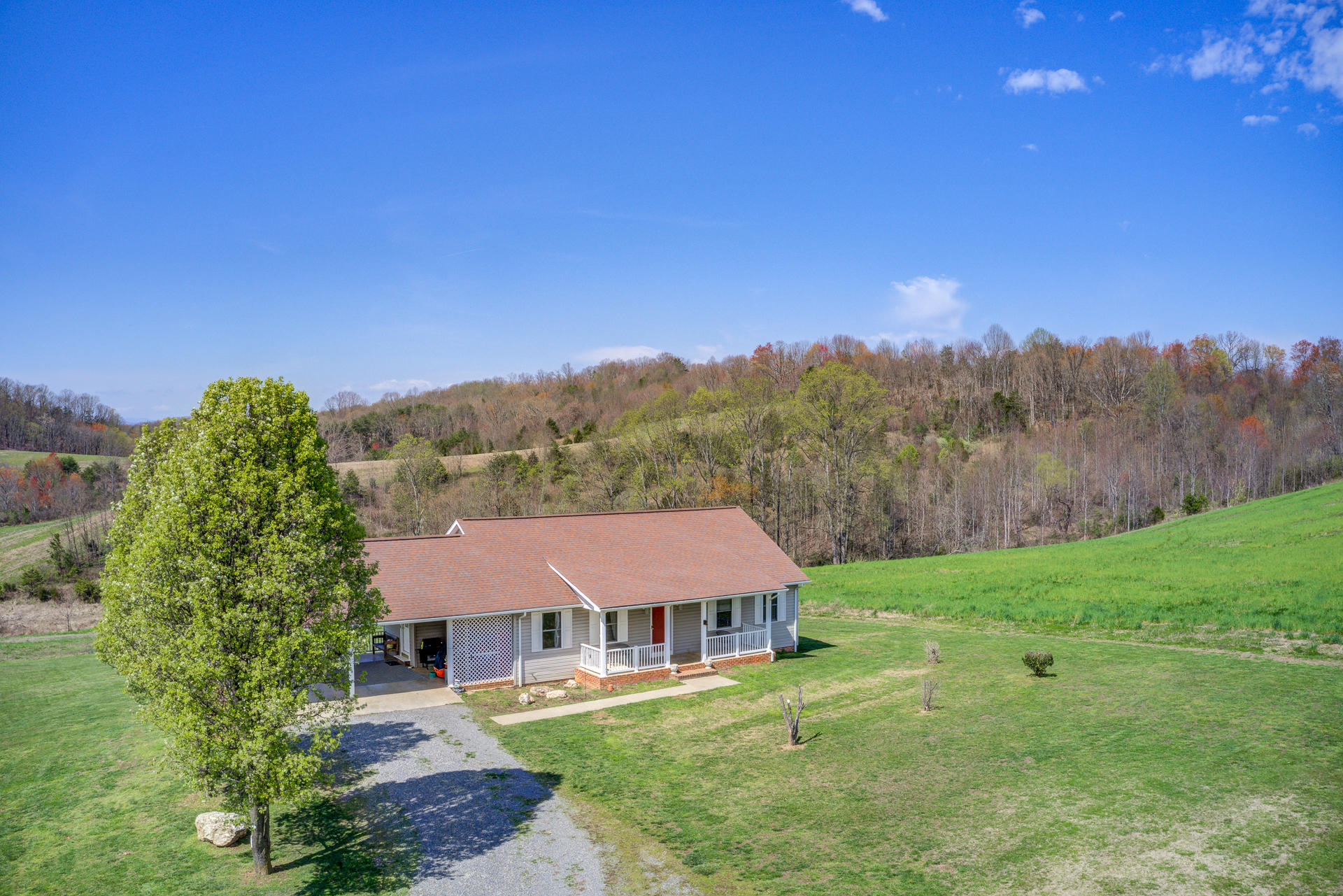 3007 Sandy Level Road Goodview, VA 24095 - Photo 28 of 51 a view of a big house with a big yard